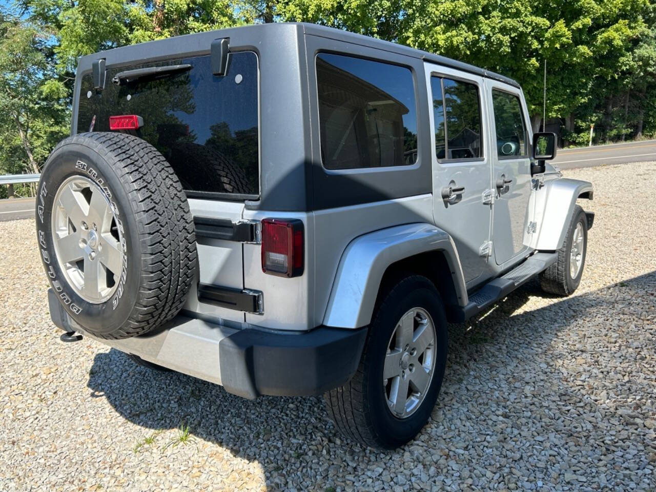 2012 Jeep Wrangler Unlimited for sale at STRODES AUTO GROUP LLP in Malta, OH