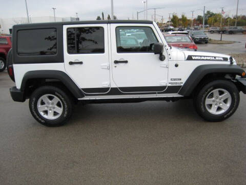 2017 Jeep Wrangler Unlimited for sale at FINNEY'S AUTO & TRUCK in Atlanta IN
