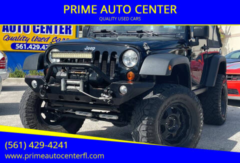 2010 Jeep Wrangler for sale at PRIME AUTO CENTER in Palm Springs FL
