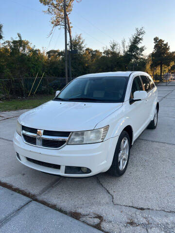 2009 Dodge Journey for sale at UNIVERSAL AUTO GROUP in Orlando FL