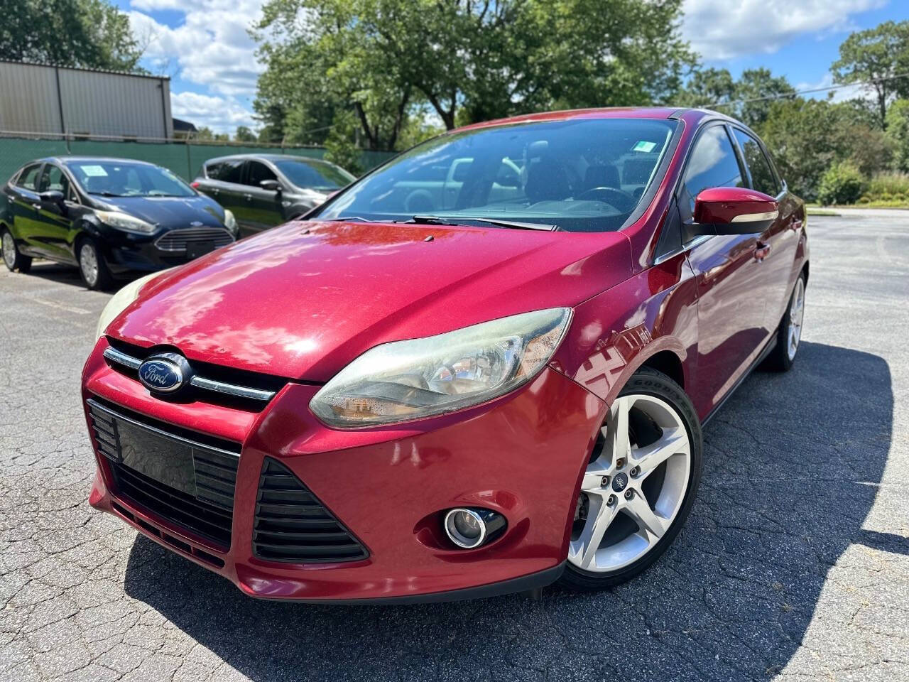 Ruby Red Metallic Tinted Clearcoat 2014 Ford Focus Sedan Front-Wheel Drive 6-Speed Automatic