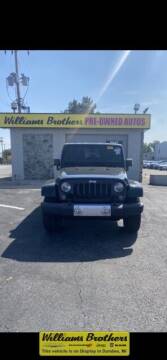 2014 Jeep Wrangler Unlimited for sale at Williams Brothers Pre-Owned Clinton in Clinton MI