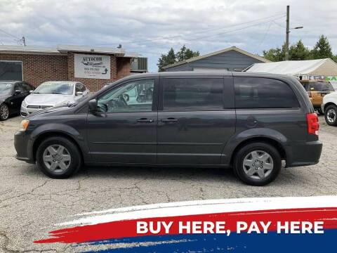 2011 Dodge Grand Caravan for sale at Autocom, LLC in Clayton NC