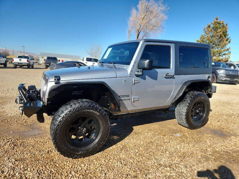 2013 Jeep Wrangler for sale at Huntsman Wholesale LLC in Melba ID