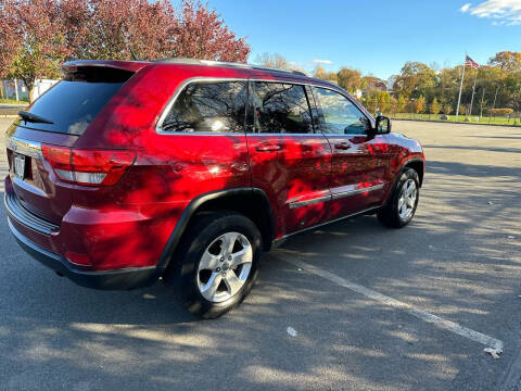 2012 Jeep Grand Cherokee for sale at NE Autos Inc in Norton MA