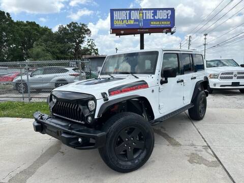 2017 Jeep Wrangler Unlimited for sale at P J Auto Trading Inc in Orlando FL