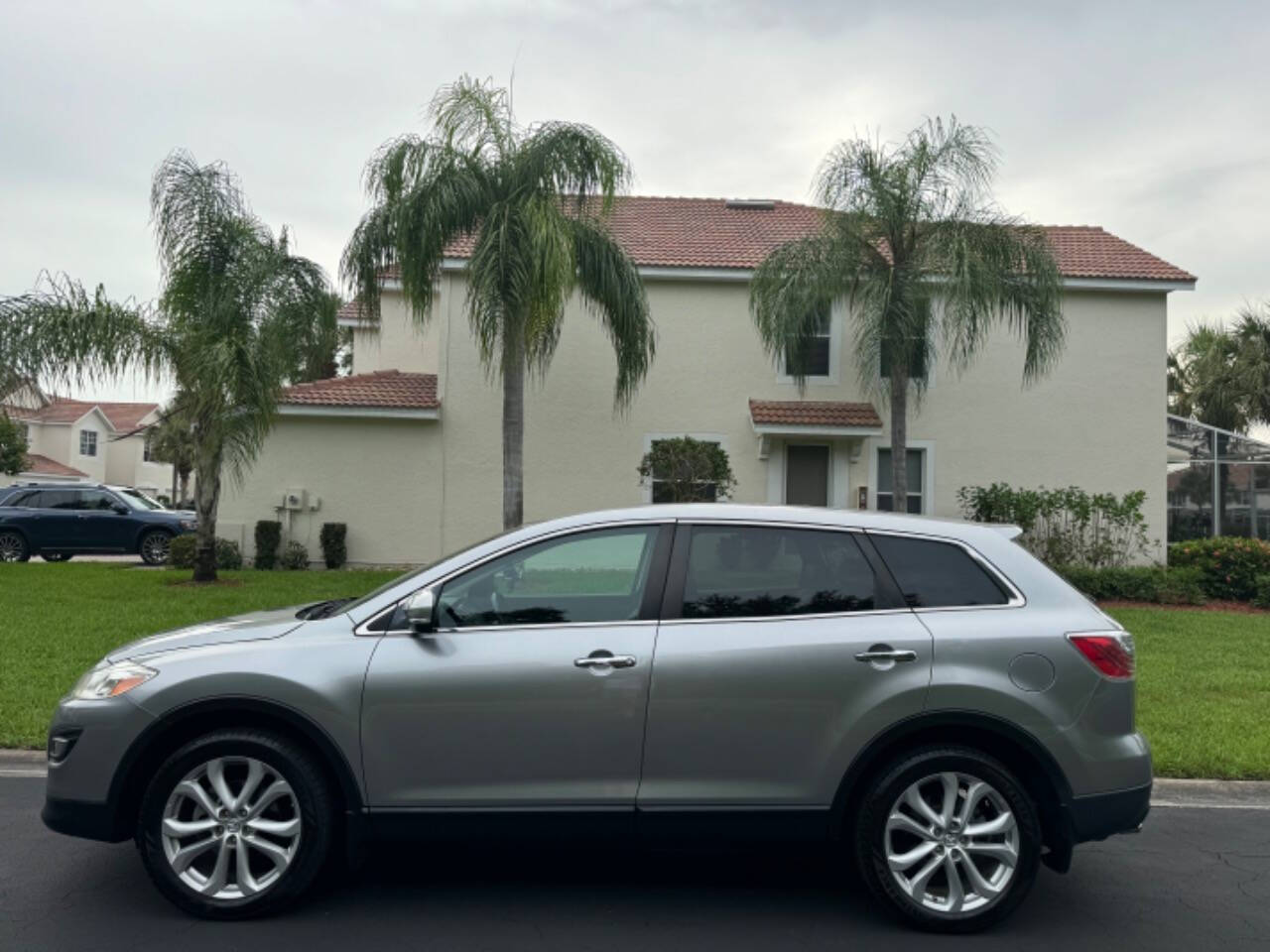 2011 Mazda CX-9 for sale at LP AUTO SALES in Naples, FL