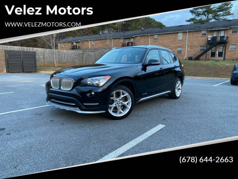 2015 BMW X1 for sale at VELEZ MOTOR COMPANY LLC in Orlando FL