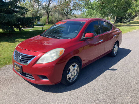 2012 Nissan Versa for sale at BELOW BOOK AUTO SALES in Idaho Falls ID
