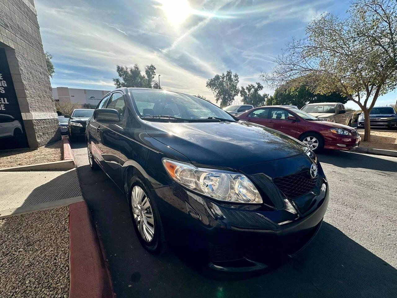 2010 Toyota Corolla for sale at HUDSONS AUTOS in Gilbert, AZ