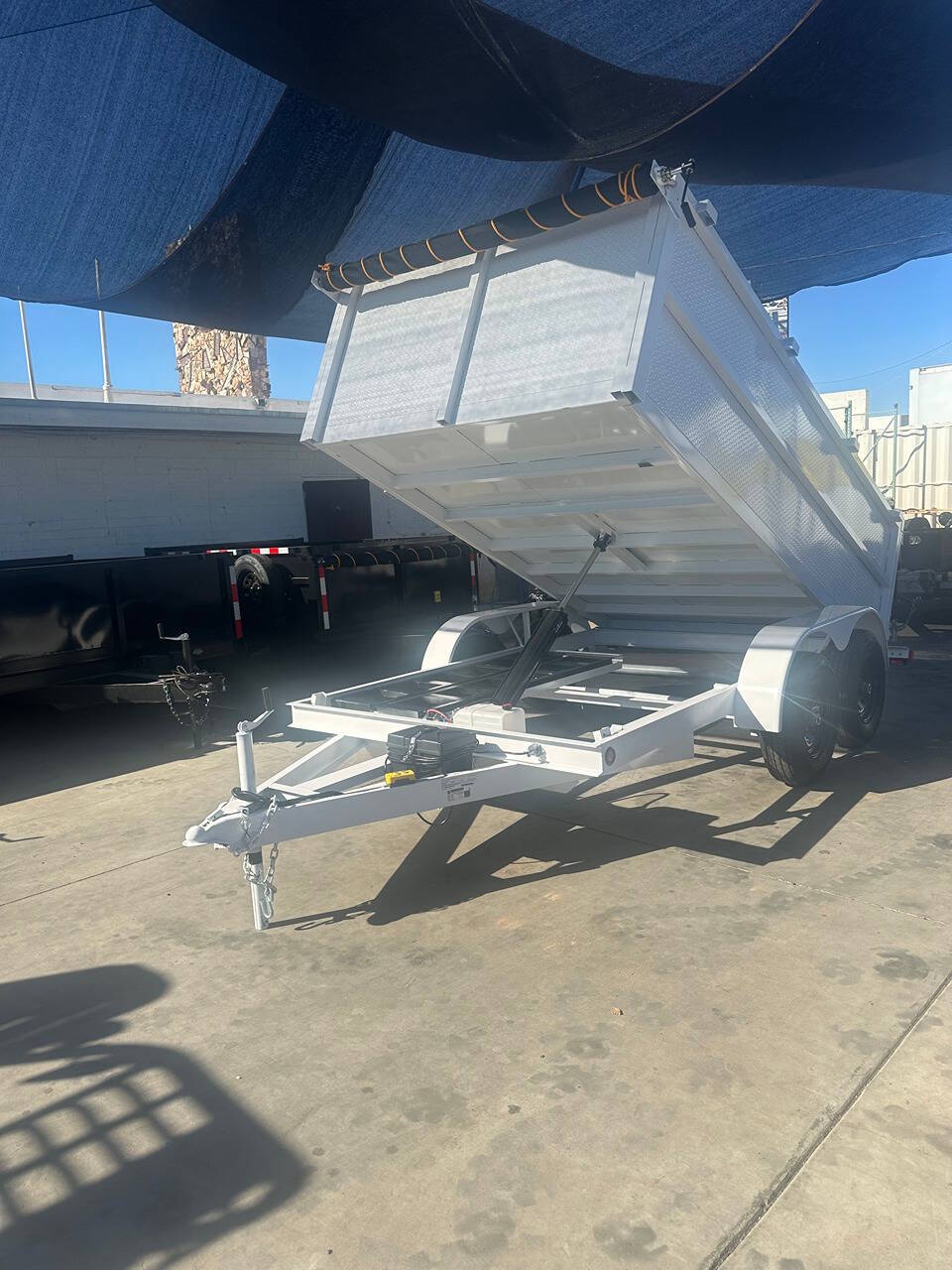 2025 Polestar 12x8x3 Diamond Plated Dump Trailer for sale at Factory Direct Trailer Sales in Phoenix, AZ