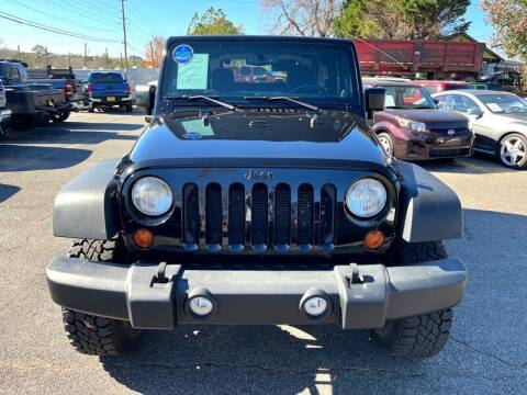 2014 Jeep Wrangler for sale at CU Carfinders in Norcross GA