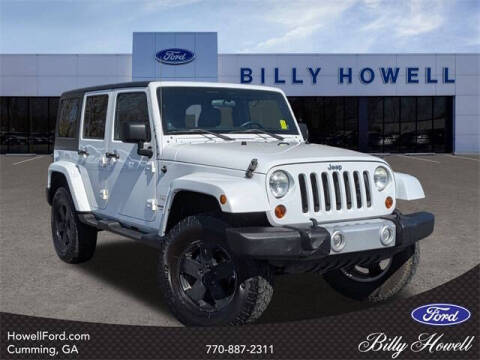 2012 Jeep Wrangler Unlimited for sale at BILLY HOWELL FORD LINCOLN in Cumming GA