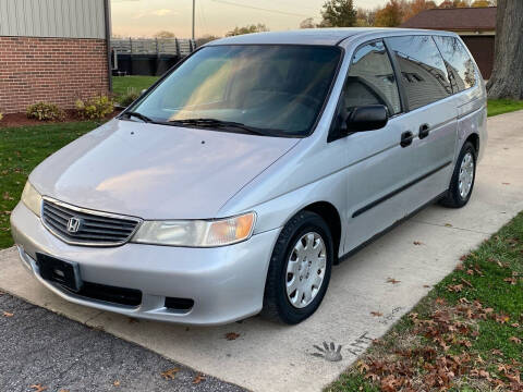 2001 Honda Odyssey for sale at THOMPSON & SONS USED CARS in Marion OH