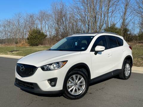 2015 Mazda CX-5 for sale at Nelson's Automotive Group in Chantilly VA