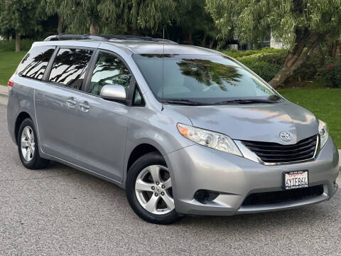 2012 Toyota Sienna for sale at MILLENNIUM MOTORS in Van Nuys CA