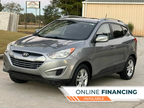 2010 Hyundai Tucson for sale at Two Brothers Auto Sales in Loganville GA