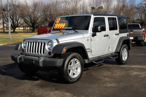 2012 Jeep Wrangler Unlimited for sale at Low Cost Cars North in Whitehall OH