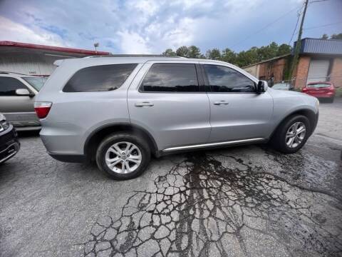 2011 Dodge Durango for sale at LAKE CITY AUTO SALES in Forest Park GA