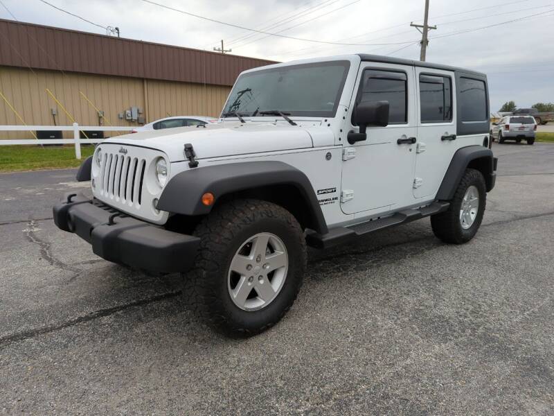 2015 Jeep Wrangler Unlimited for sale at Towell & Sons Auto Sales in Manila AR