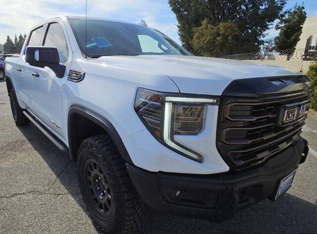 Used 2024 GMC Sierra 1500 AT4X with VIN 3GTUUFEL6RG286974 for sale in Bloomington, IL