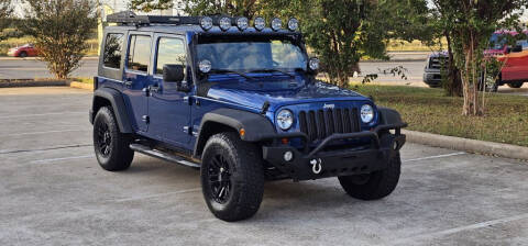 2010 Jeep Wrangler Unlimited for sale at America's Auto Financial in Houston TX