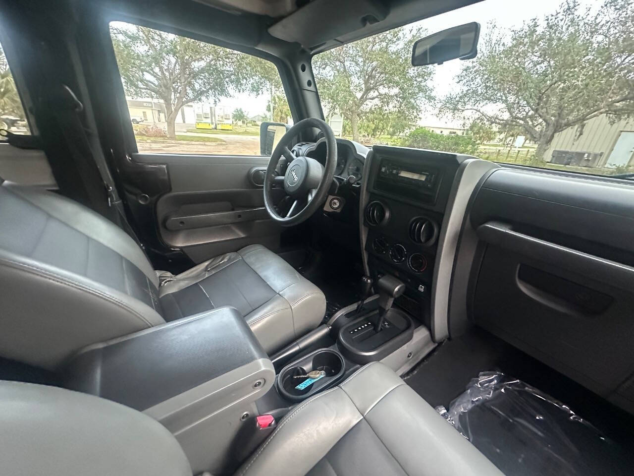 2009 Jeep Wrangler for sale at Rubi Motorsports in Sarasota, FL