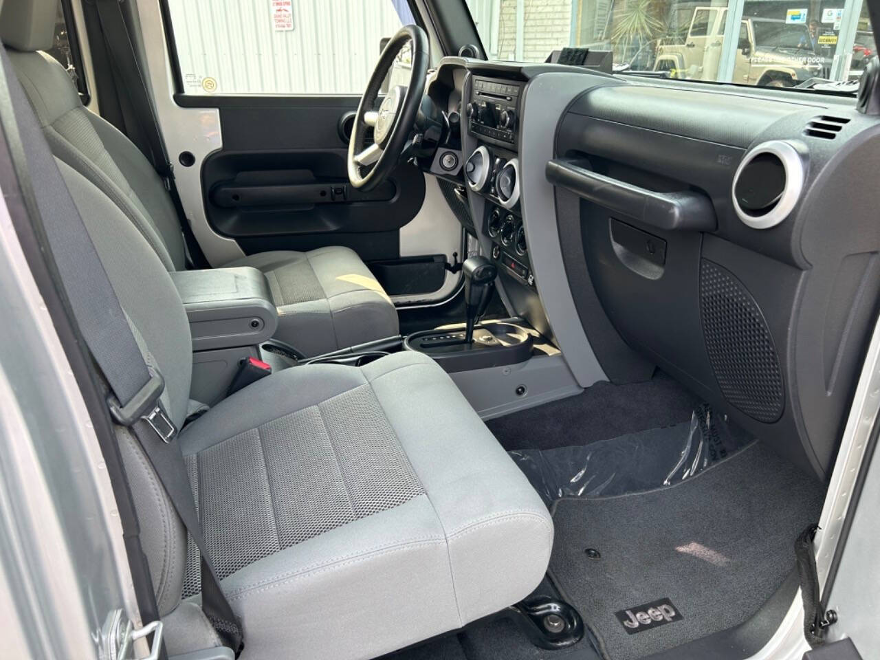 2008 Jeep Wrangler Unlimited for sale at Auto Shop in Wyoming, MI