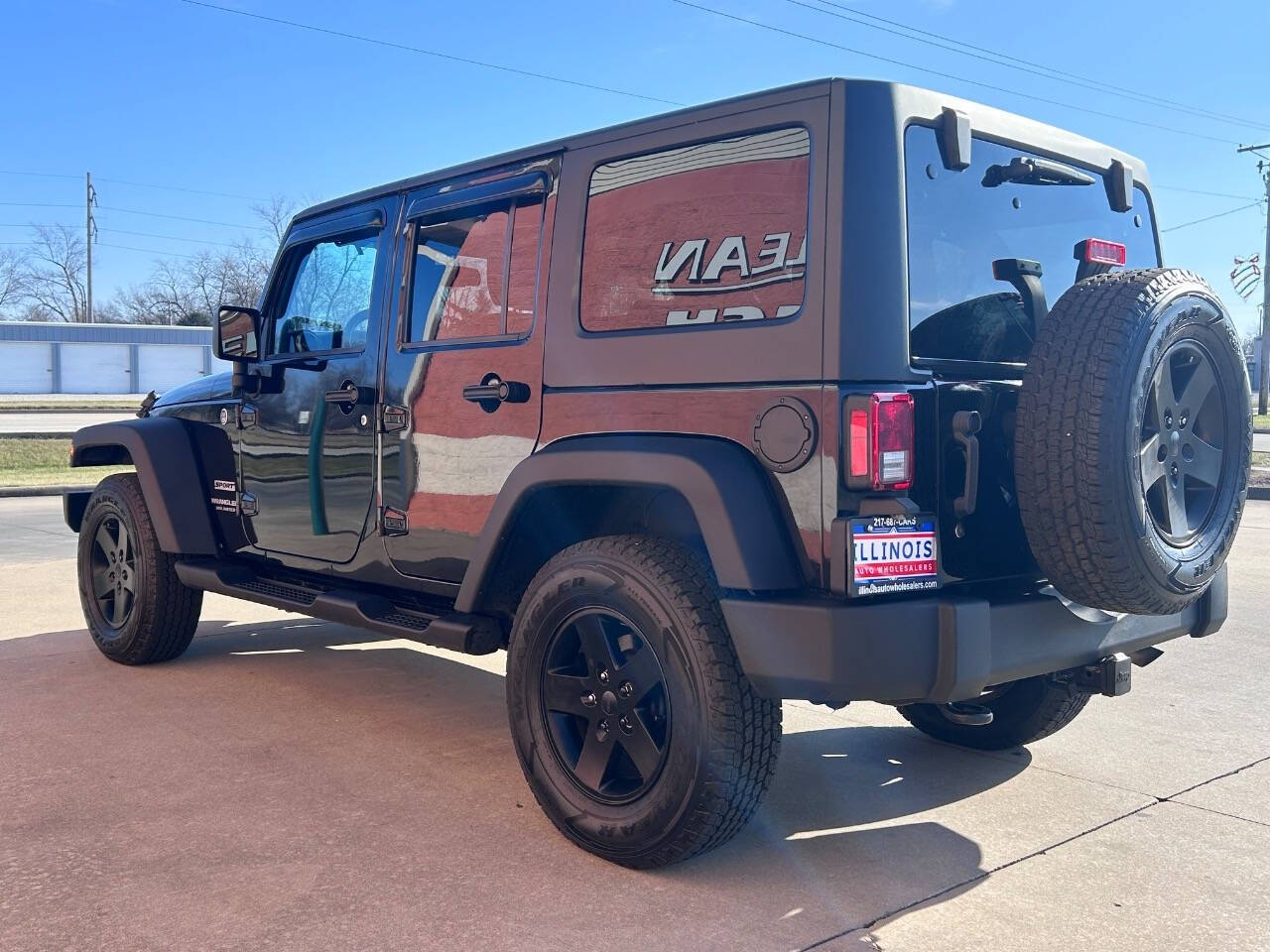 2014 Jeep Wrangler Unlimited for sale at Illinois Auto Wholesalers in Tolono, IL