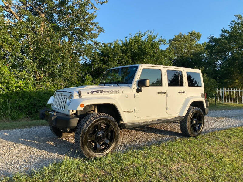 2017 Jeep Wrangler Unlimited for sale at CAVENDER MOTORS in Van Alstyne TX