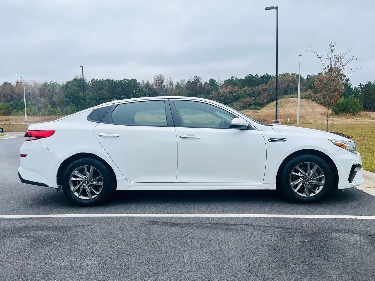 2019 Kia Optima for sale at Bluegate Motors LLC in Garner, NC