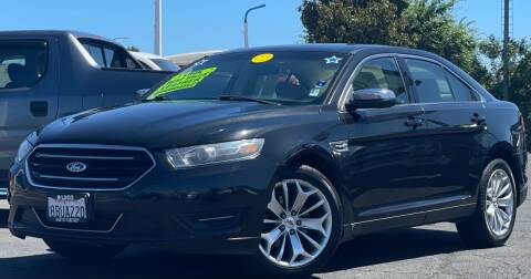 2014 Ford Taurus for sale at Lugo Auto Group in Sacramento CA