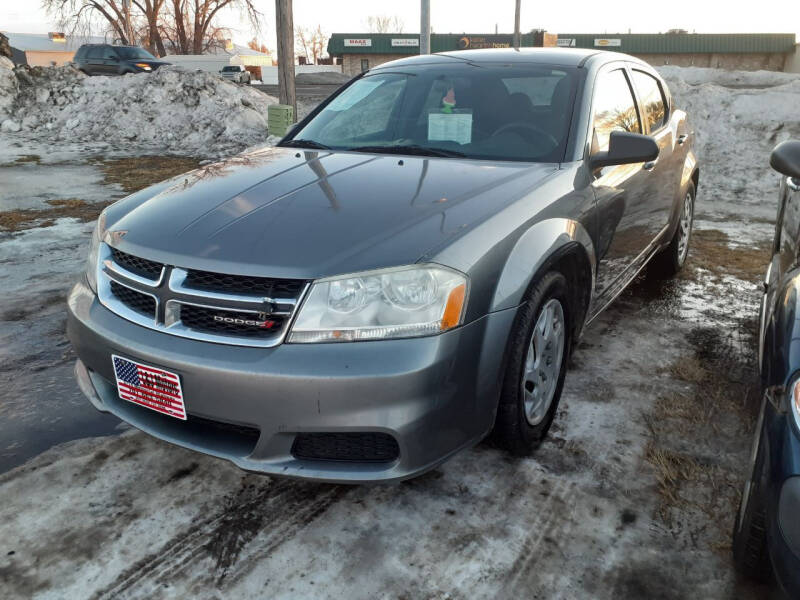 2012 Dodge Avenger for sale at L & J Motors in Mandan ND