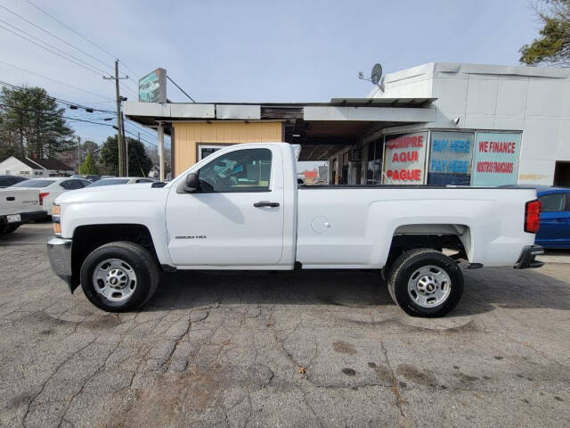 2015 Chevrolet Silverado 2500HD for sale at DAGO'S AUTO SALES LLC in Dalton, GA