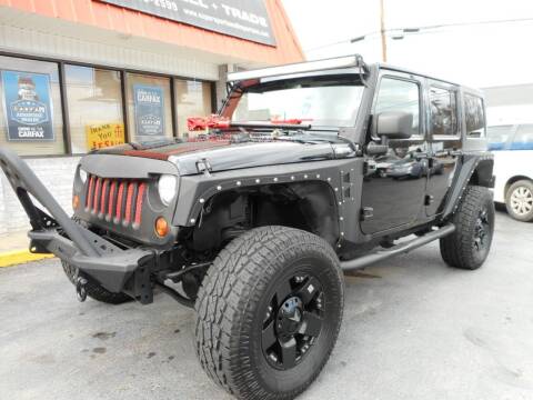 2013 Jeep Wrangler Unlimited for sale at Super Sports & Imports in Jonesville NC