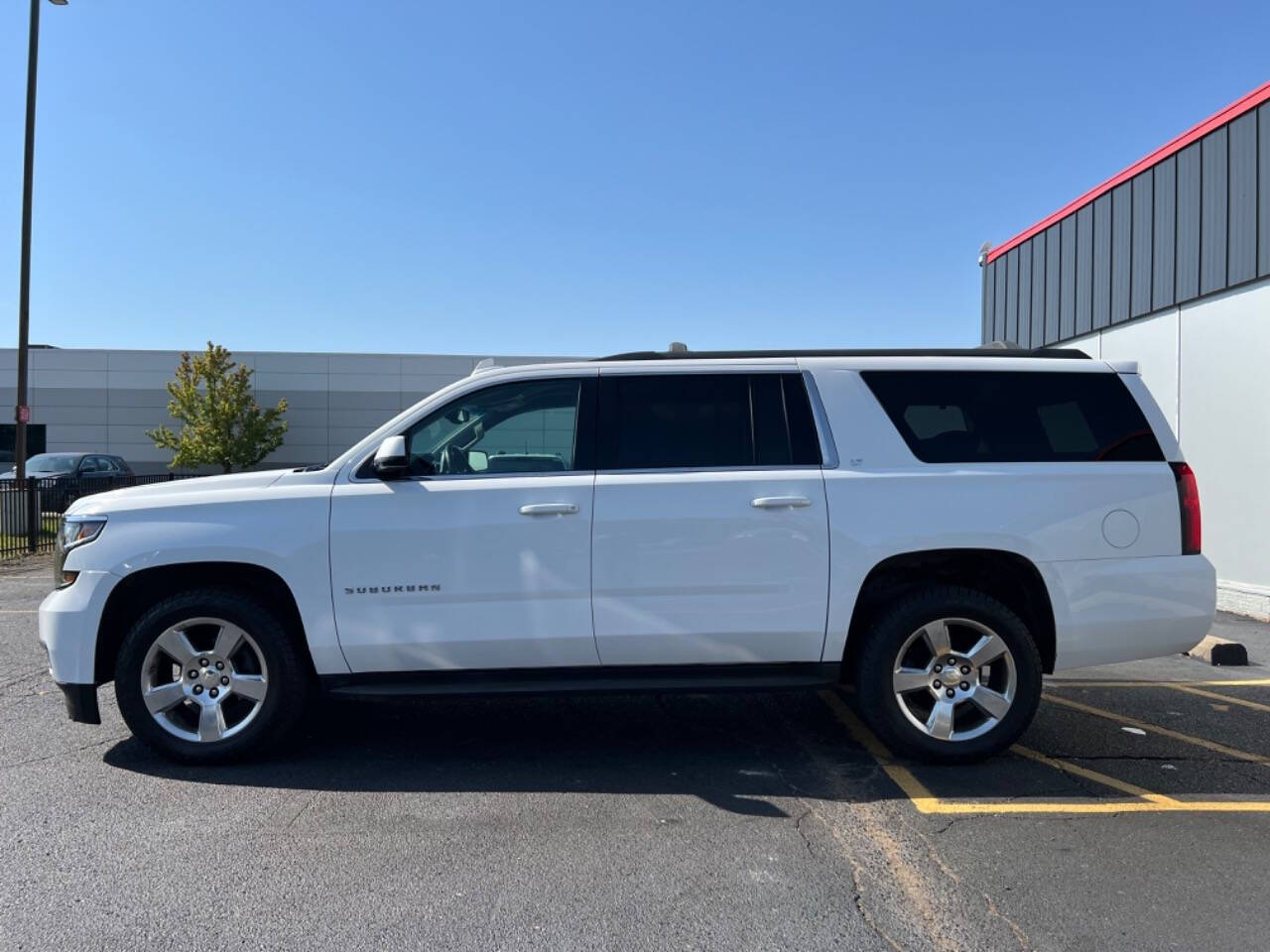 2015 Chevrolet Suburban for sale at Carventure in Lansing, MI