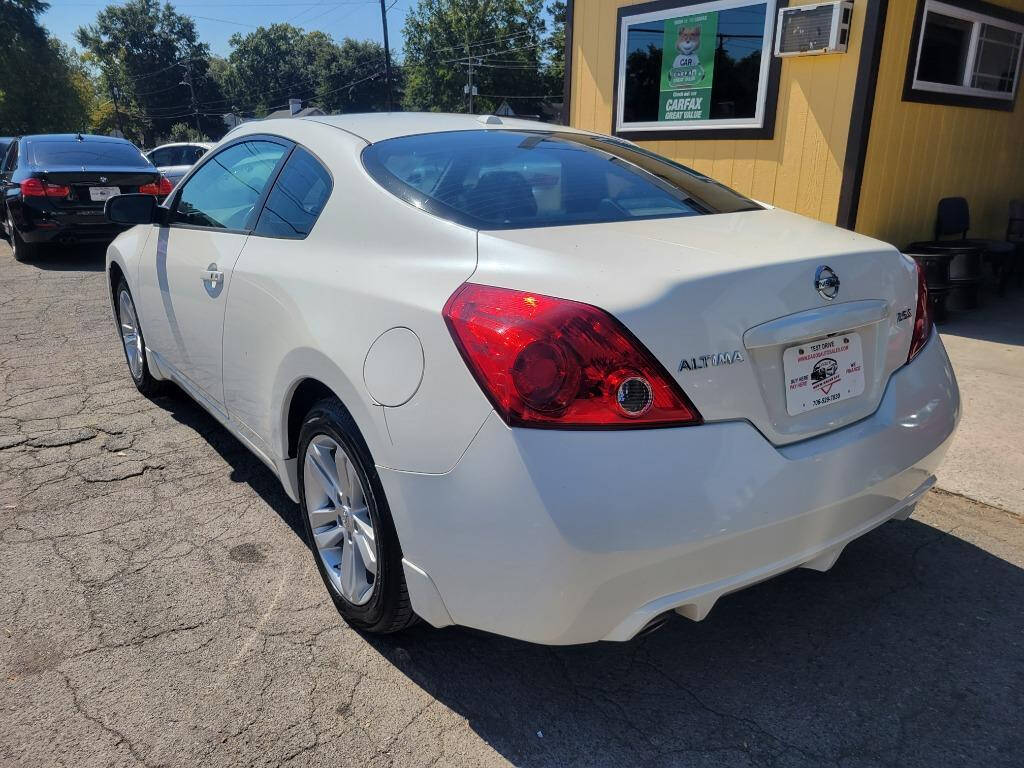 2012 Nissan Altima for sale at DAGO'S AUTO SALES LLC in Dalton, GA