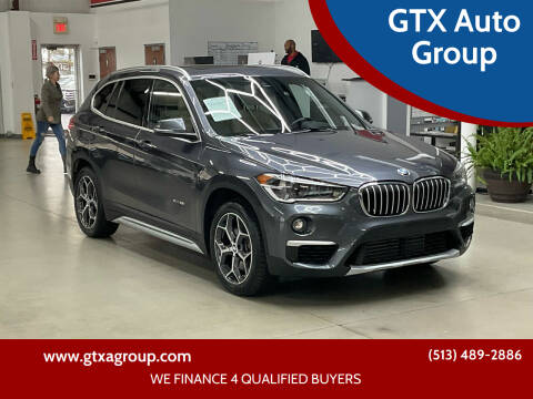 2016 BMW X1 for sale at GTX Auto Group in West Chester OH