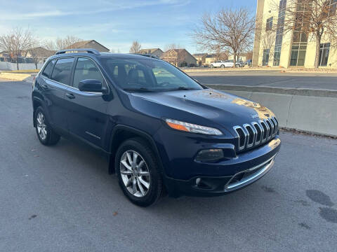 2014 Jeep Cherokee for sale at The Car-Mart in Bountiful UT