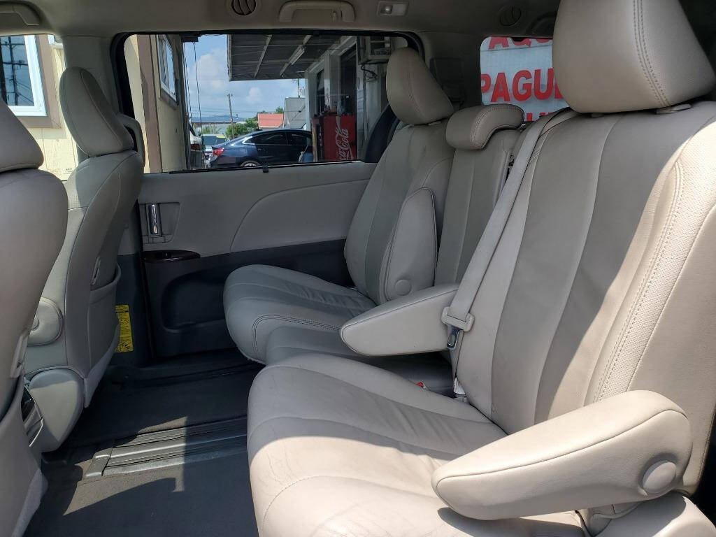 2013 Toyota Sienna for sale at DAGO'S AUTO SALES LLC in Dalton, GA