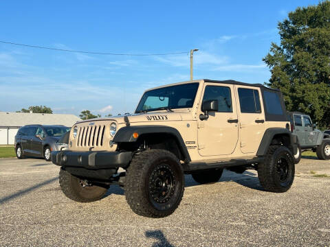 2016 Jeep Wrangler Unlimited for sale at Carworx LLC in Dunn NC