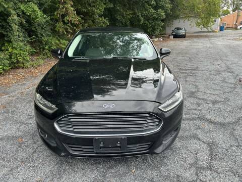 2016 Ford Fusion for sale at YASSE'S AUTO SALES in Steelton PA