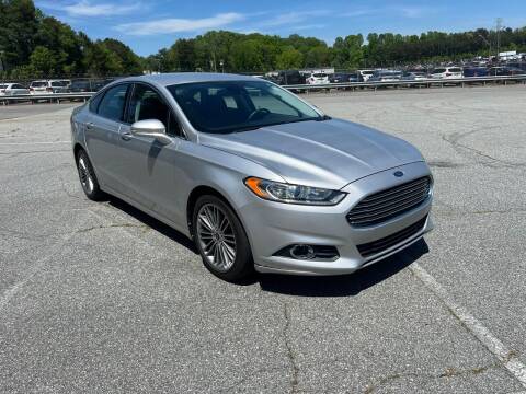 2013 Ford Fusion for sale at Triple A's Motors in Greensboro NC