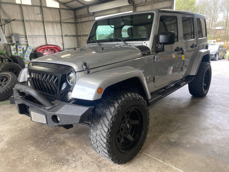 2016 Jeep Wrangler Unlimited for sale at Walker Family Automotive in Albertville AL