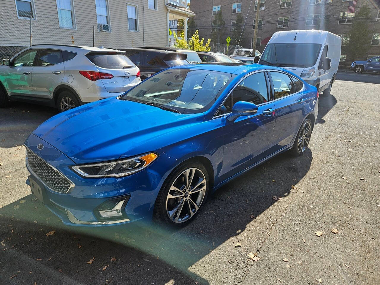 2020 Ford Fusion for sale at RENOS AUTO SALES LLC in Waterbury, CT