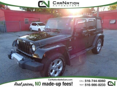 2015 Jeep Wrangler Unlimited for sale at CarNation AUTOBUYERS Inc. in Rockville Centre NY