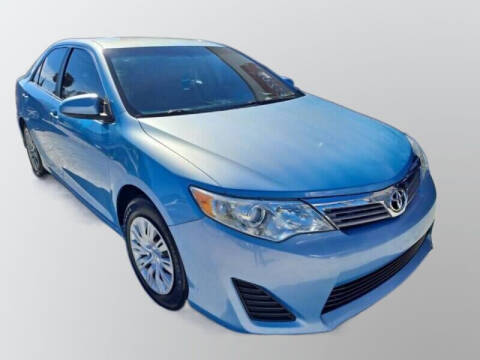 2012 Toyota Camry for sale at BestCar in Kissimmee FL