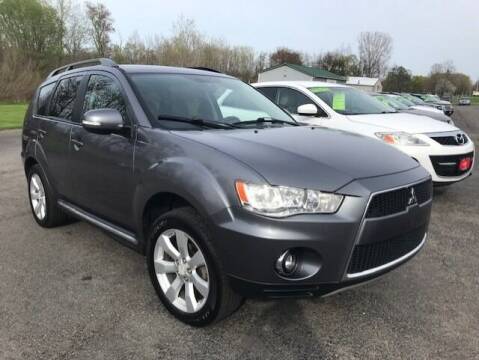 2010 Mitsubishi Outlander for sale at FUSION AUTO SALES in Spencerport NY