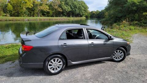 2010 Toyota Corolla for sale at Auto Link Inc. in Spencerport NY
