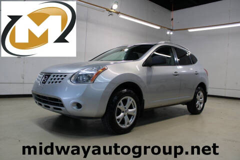 2009 Nissan Rogue for sale at Midway Auto Group in Addison TX